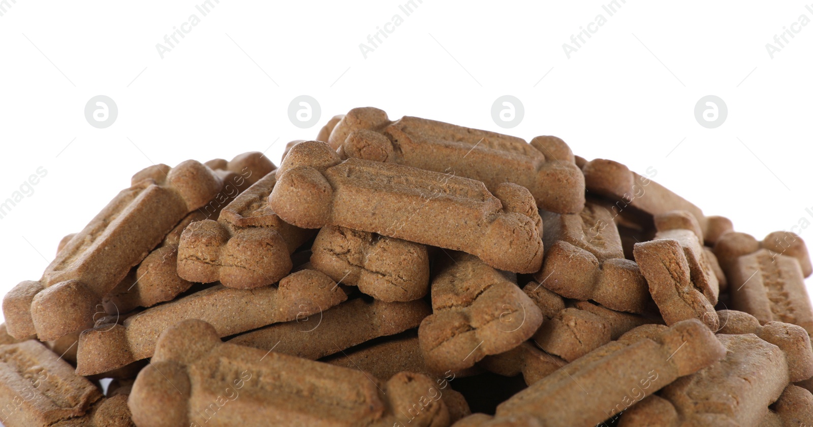 Photo of Pile of bone shaped dog cookies on white background, closeup