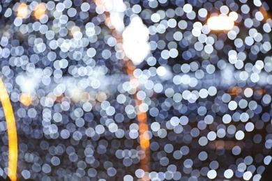 Photo of Blurred shiny lights as background. Bokeh effect