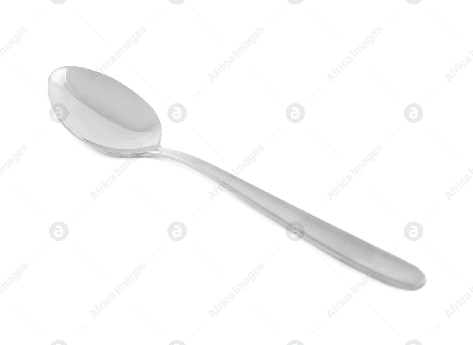 Photo of Clean shiny metal spoon isolated on white