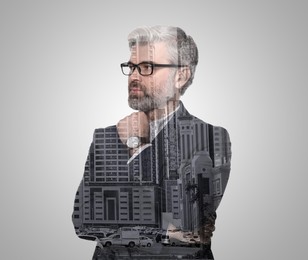 Image of Double exposure of businessman and cityscape with office buildings