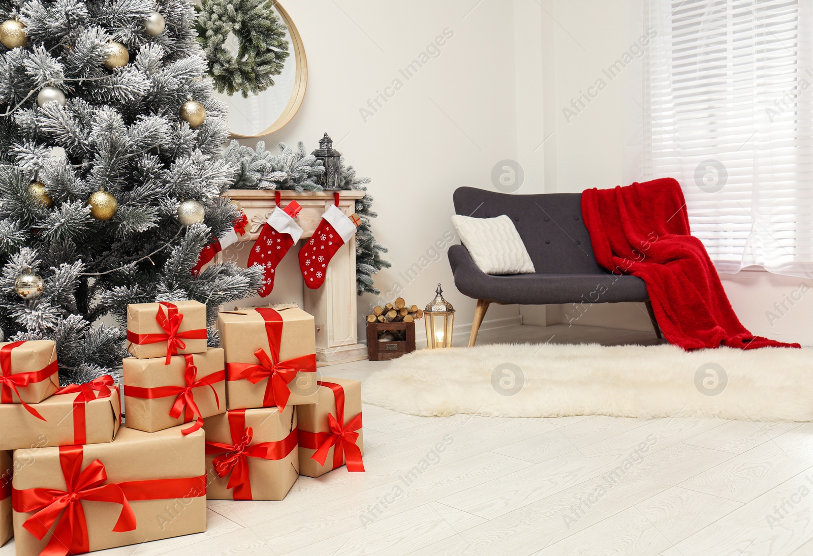 Photo of Stylish Christmas interior with decorated fir tree and fireplace