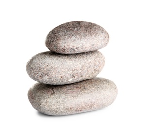 Stack of zen spa stones on white background