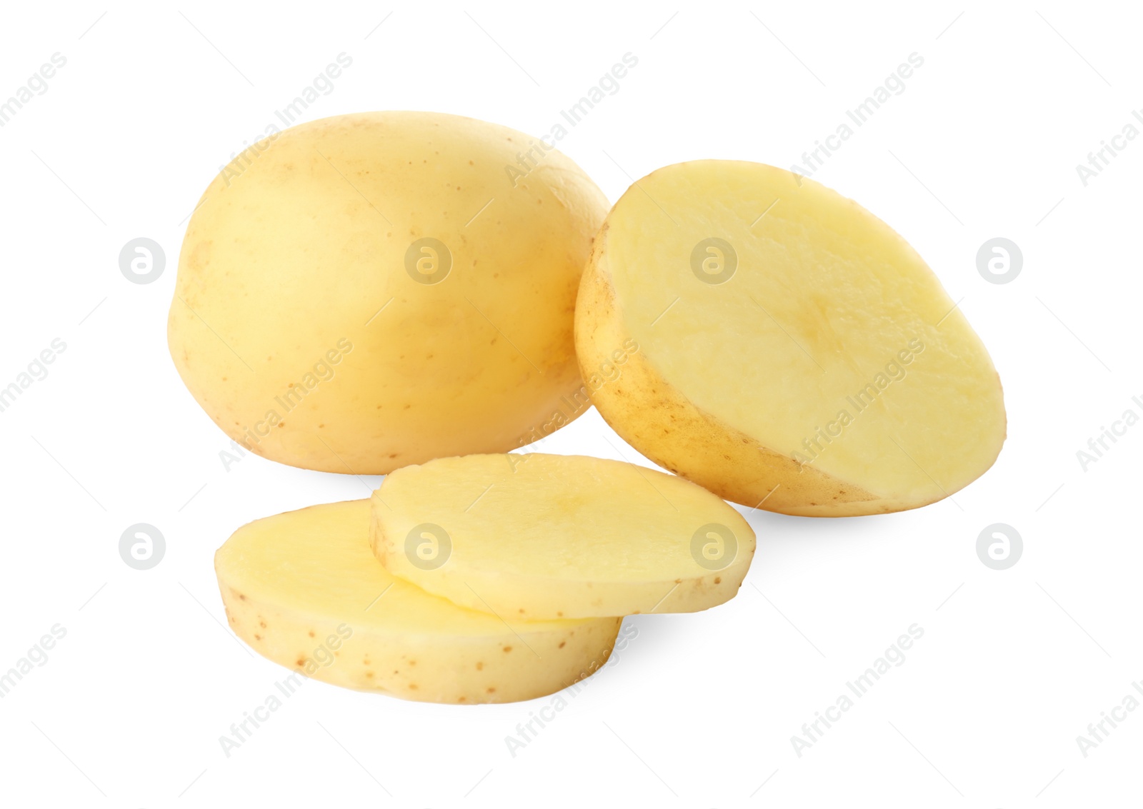 Photo of Whole and cut fresh raw organic potatoes on white background