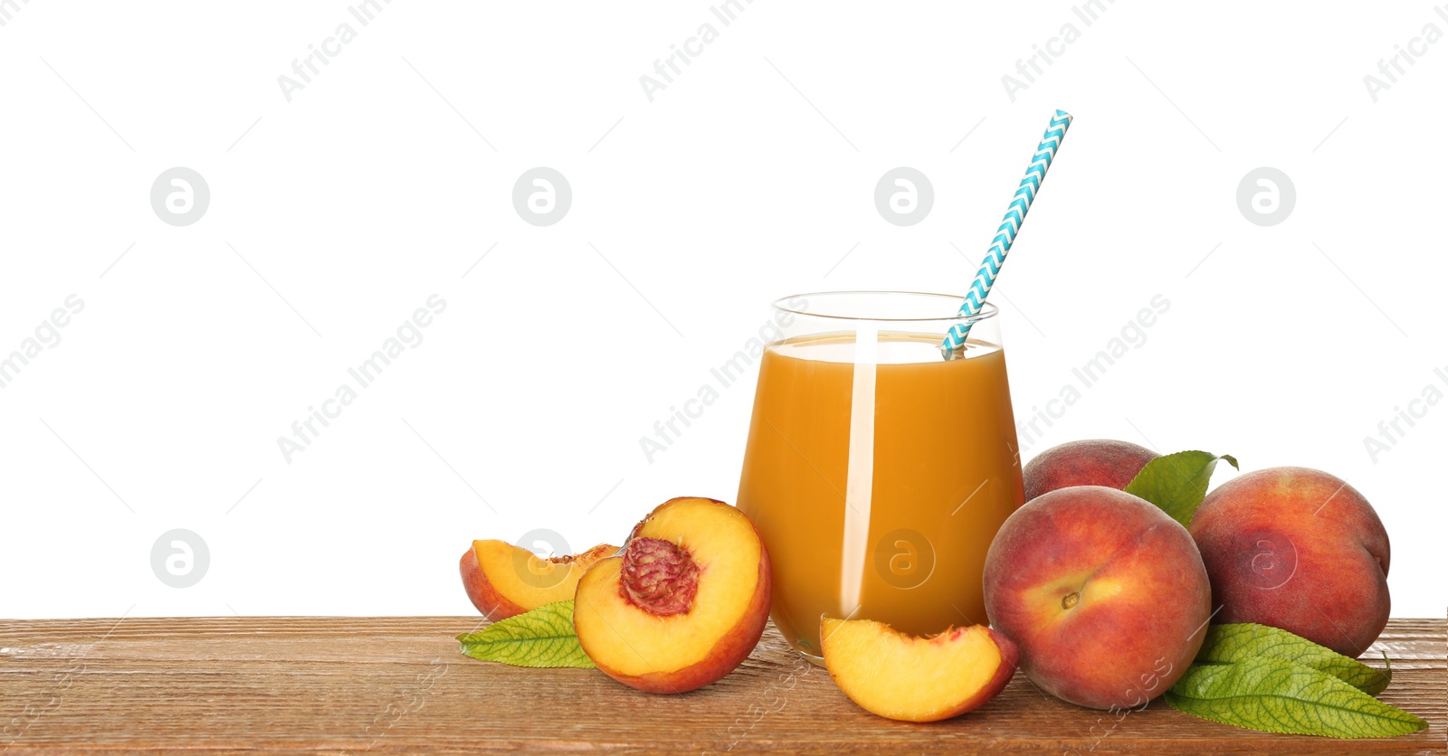 Photo of Natural freshly made peach juice on wooden table, white background