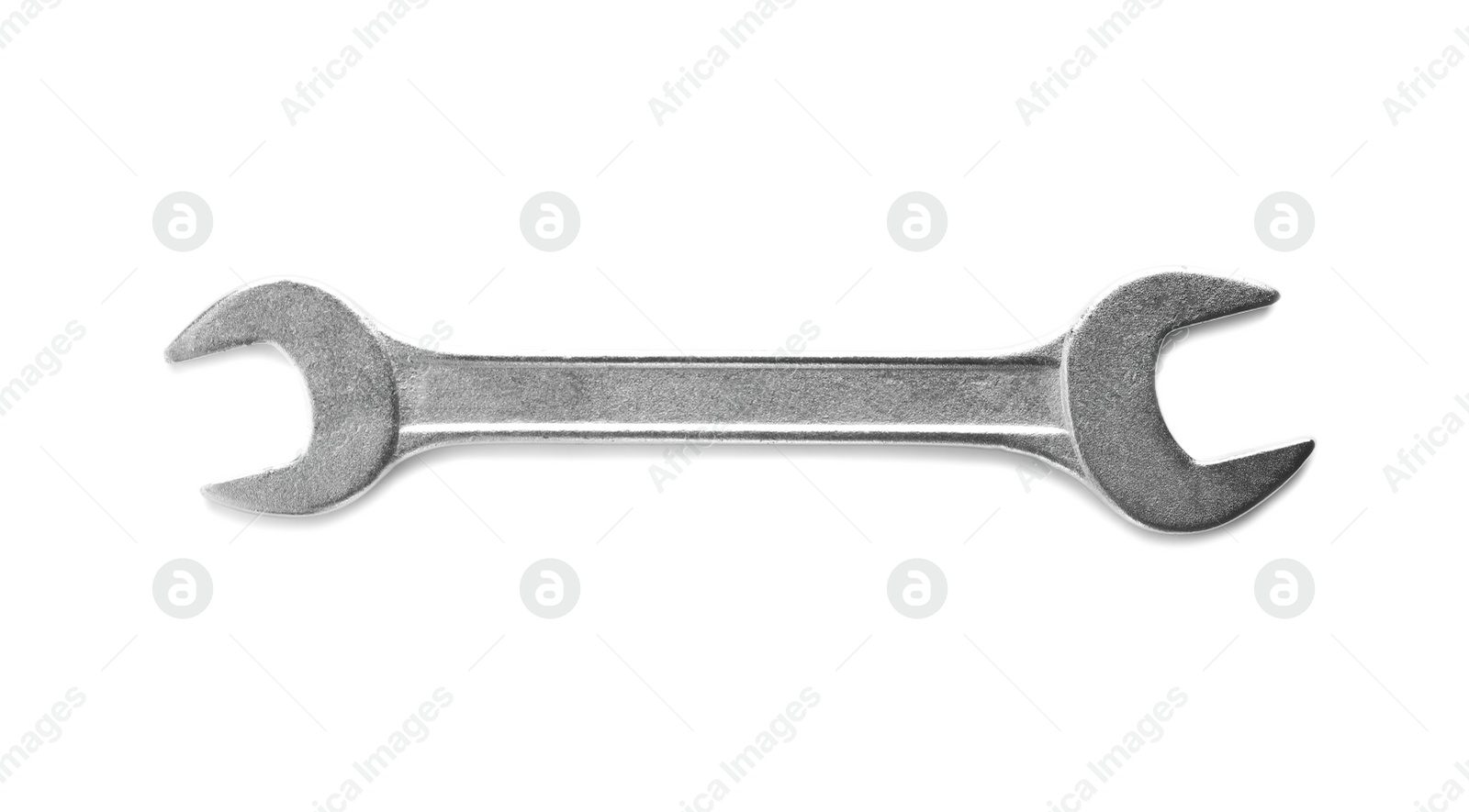 Photo of New wrench on white background, top view. Plumber tools