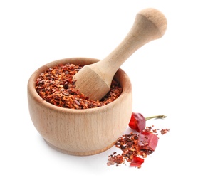 Photo of Wooden mortar with chili pepper flakes on white background