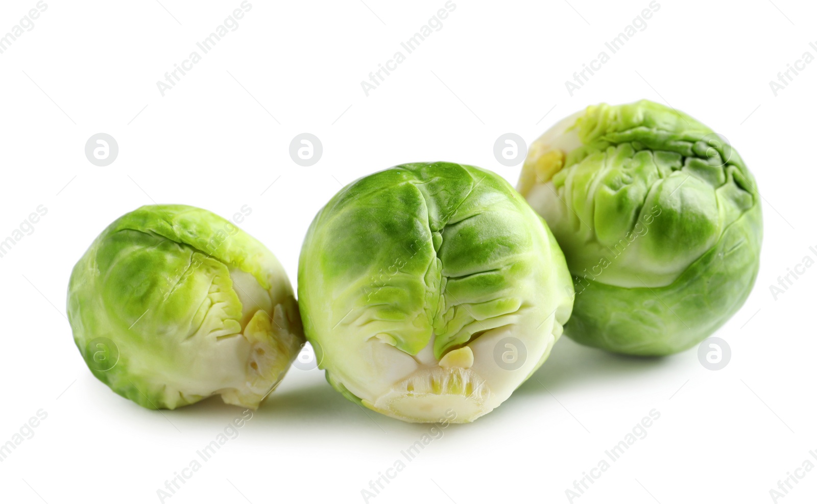 Photo of Fresh tasty Brussels sprouts on white background