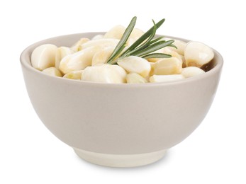 Photo of Peeled garlic cloves with honey and rosemary in bowl isolated on white