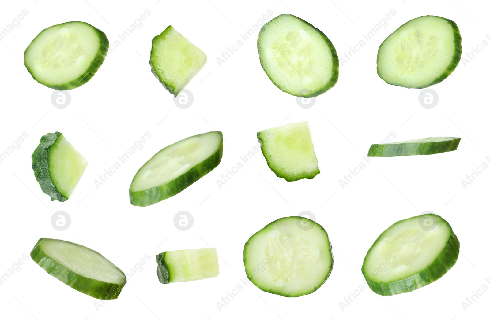 Image of Set of fresh cucumber slices on white background