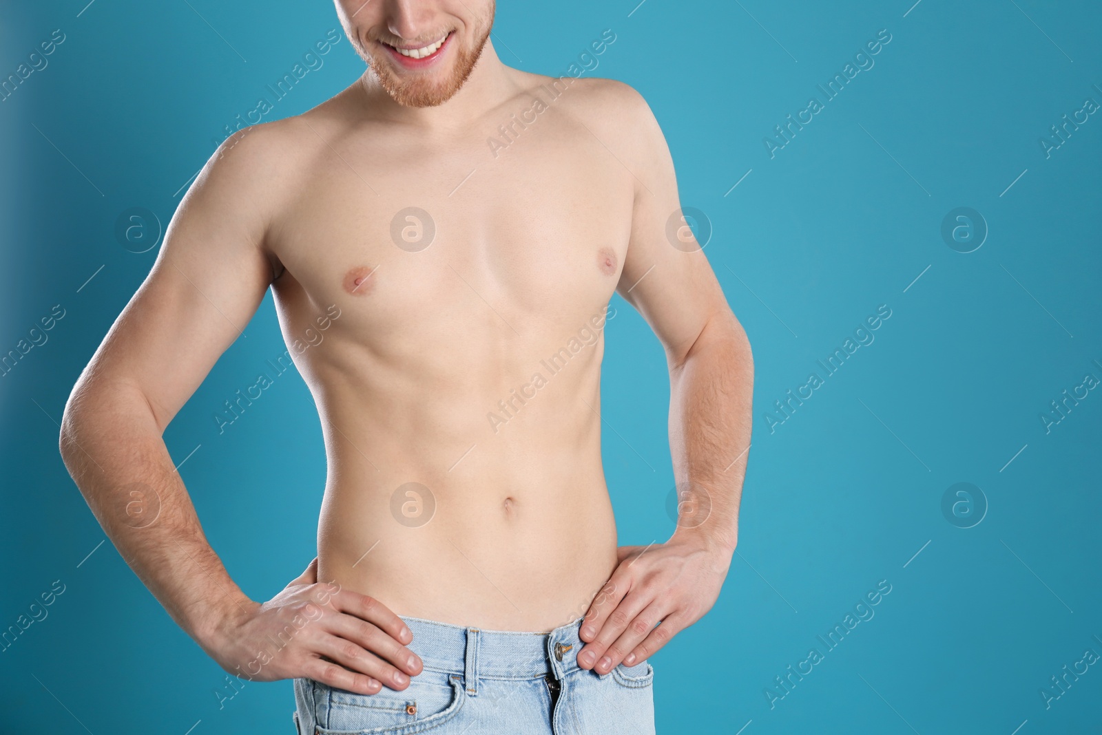 Photo of Man with slim body on color background, closeup. Space for text