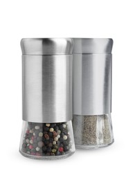 Pepper shaker and pepper mill isolated on white