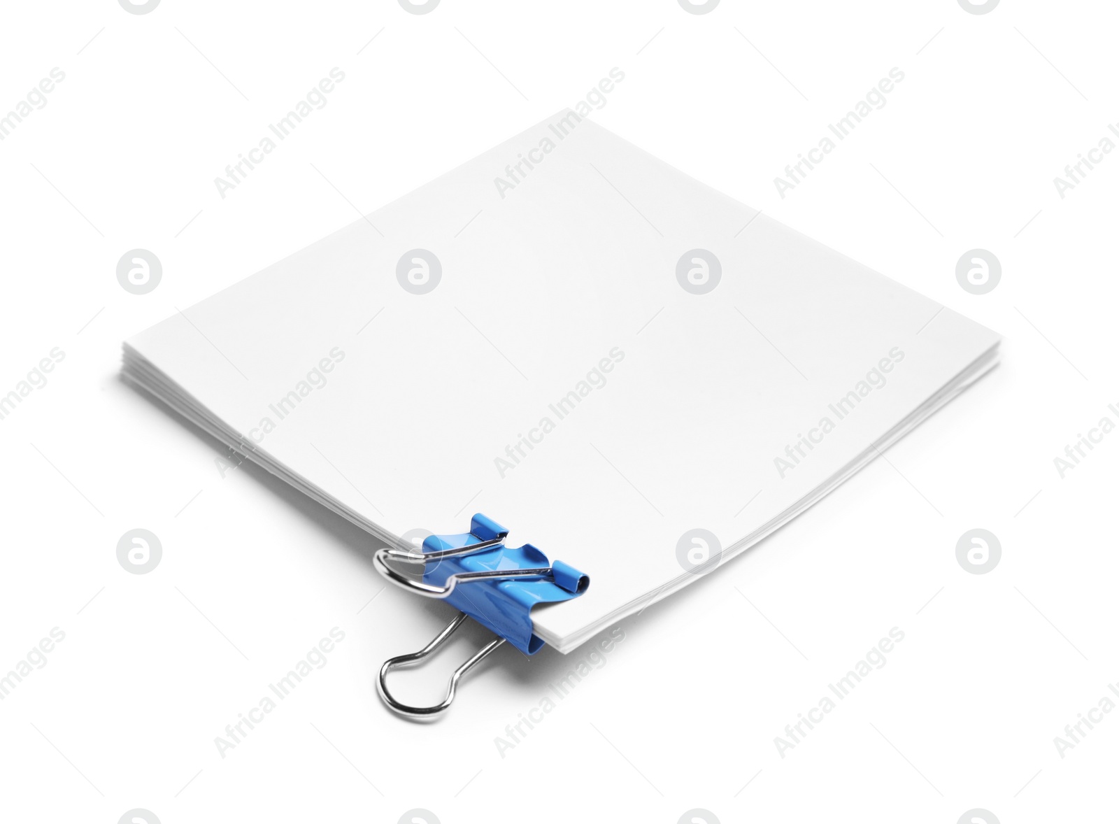 Photo of Note paper sheets with blue clip isolated white