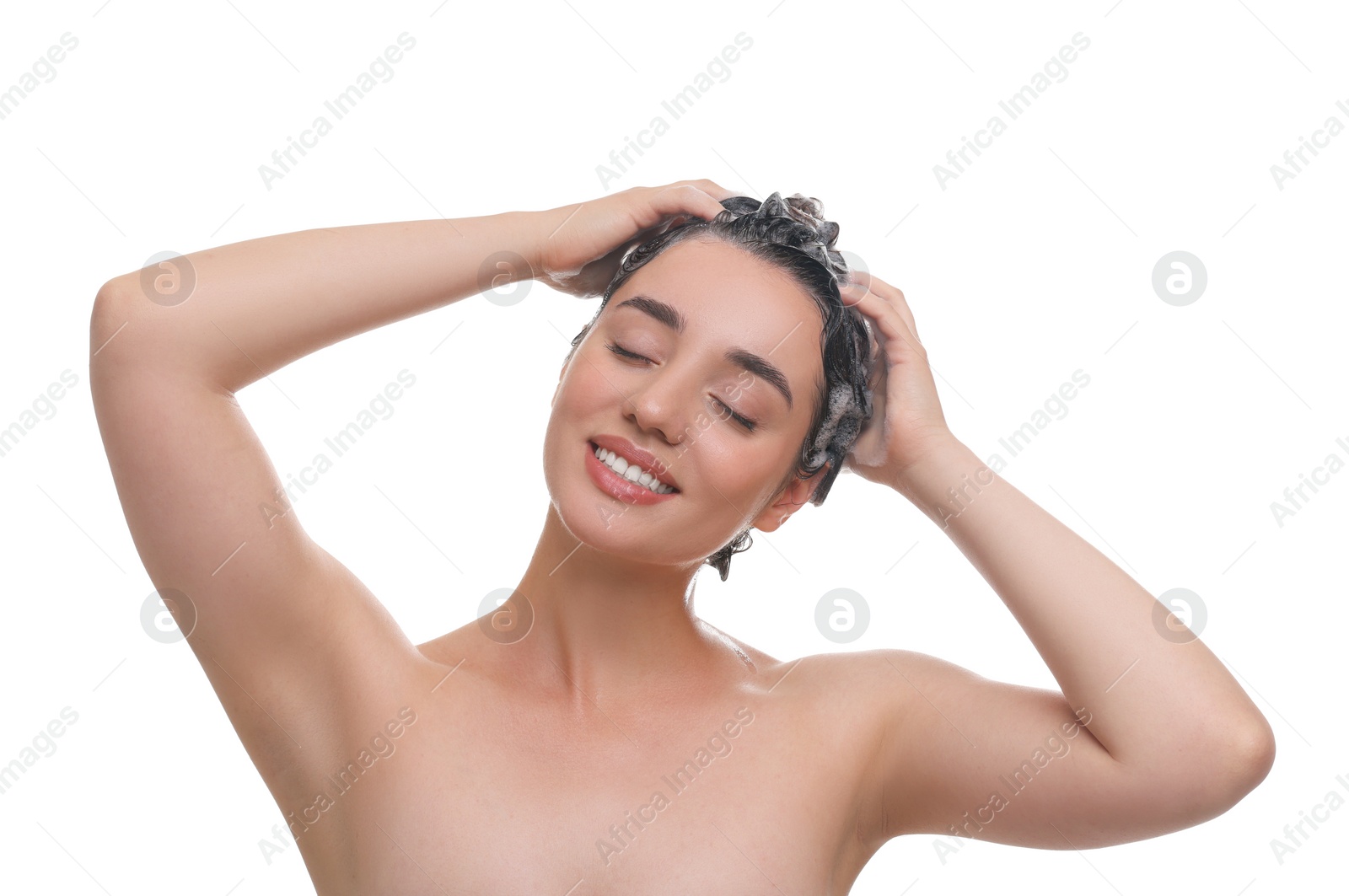 Photo of Beautiful happy woman washing hair on white background