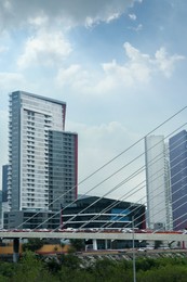 Photo of View of beautiful city from modern bridge