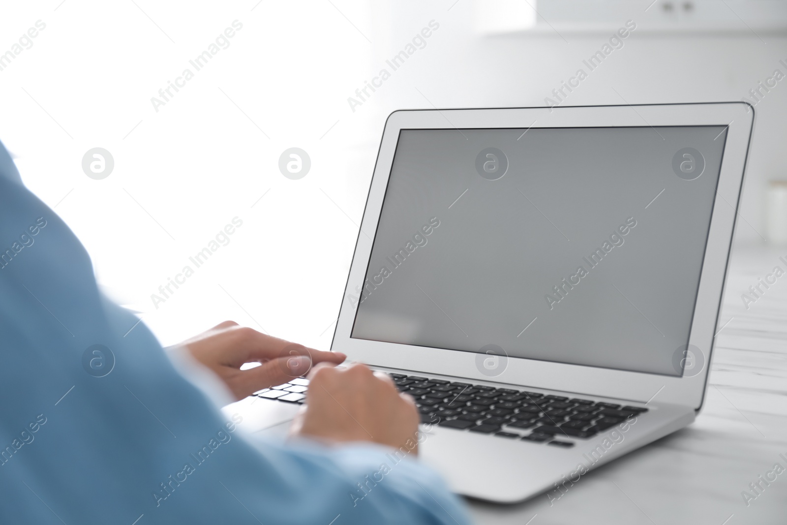 Photo of Coworkers working together online. Young woman using video chat on laptop, closeup