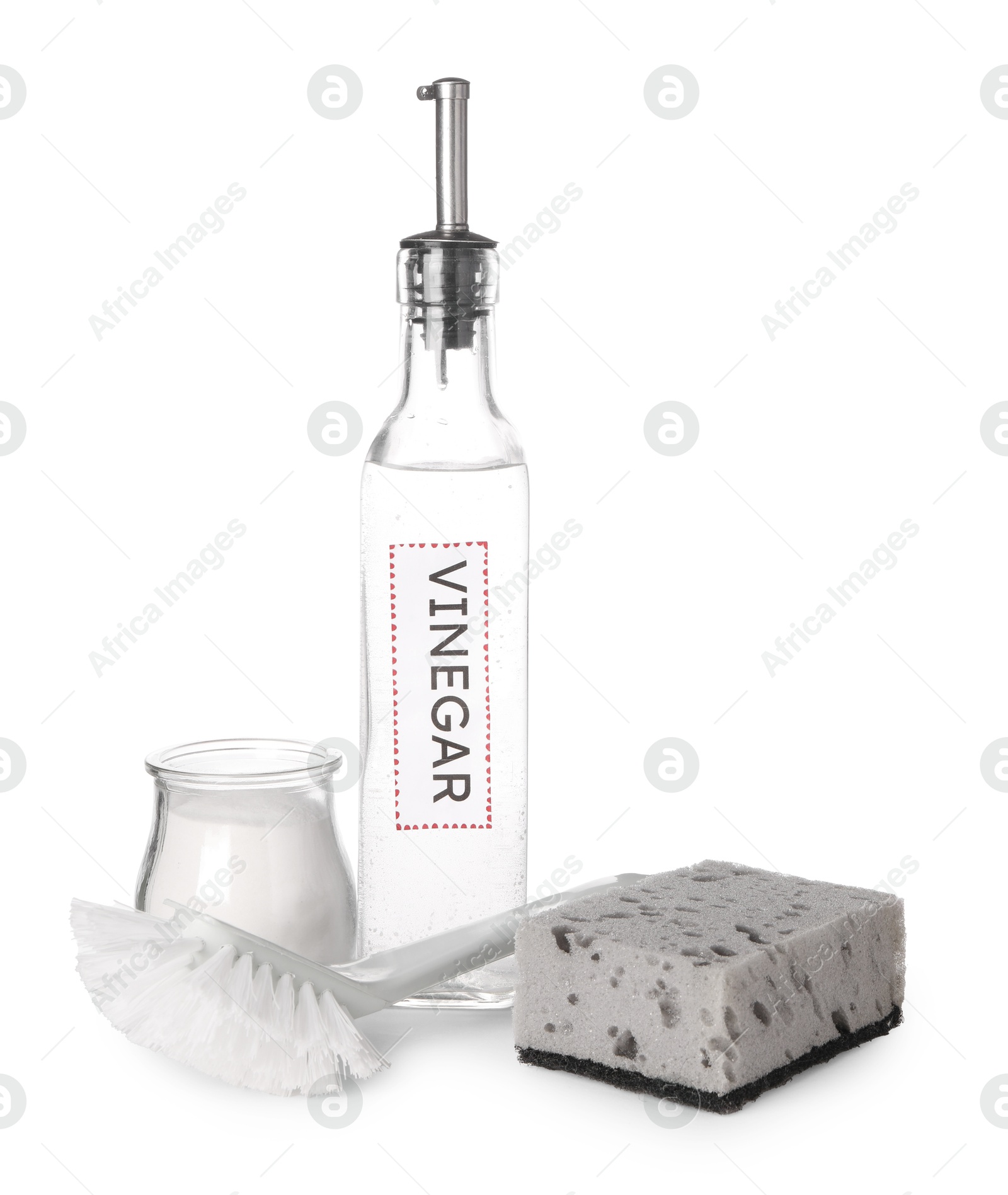 Photo of Eco friendly natural cleaners. Vinegar in bottle, brush, jar of soda and sponge isolated on white