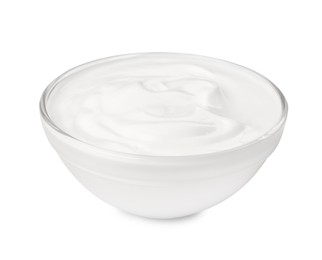 Photo of Glass bowl with delicious organic yogurt isolated on white