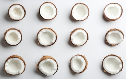 Photo of Coconut pattern on white background, top view