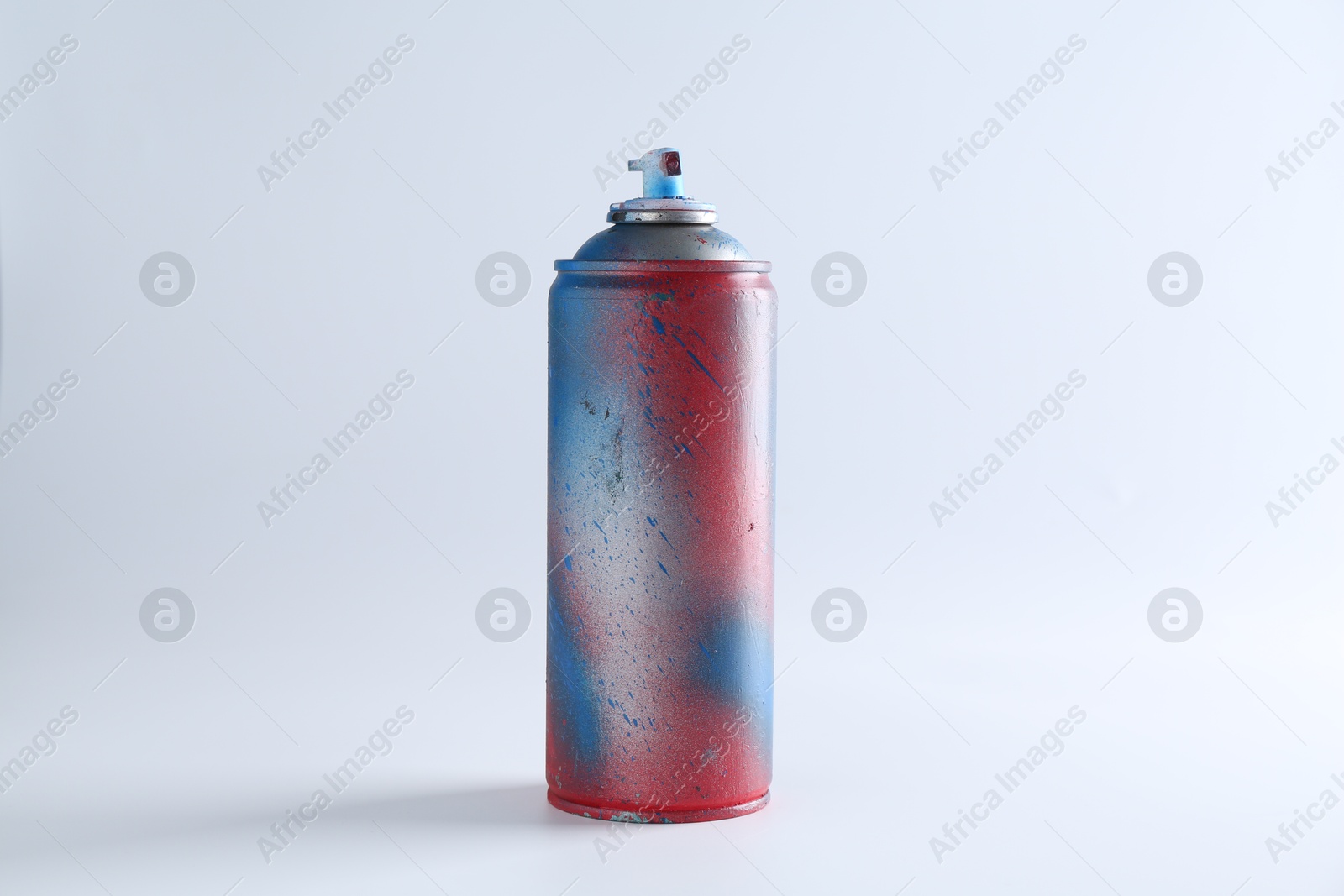 Photo of One spray paint can on white background