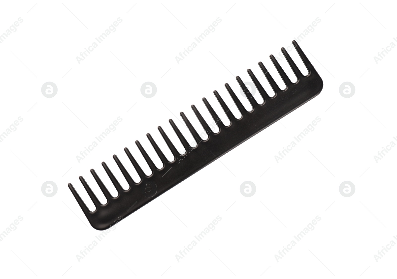 Photo of New plastic hair comb isolated on white, top view