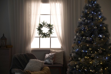 Photo of Beautiful interior of living room with decorated Christmas tree
