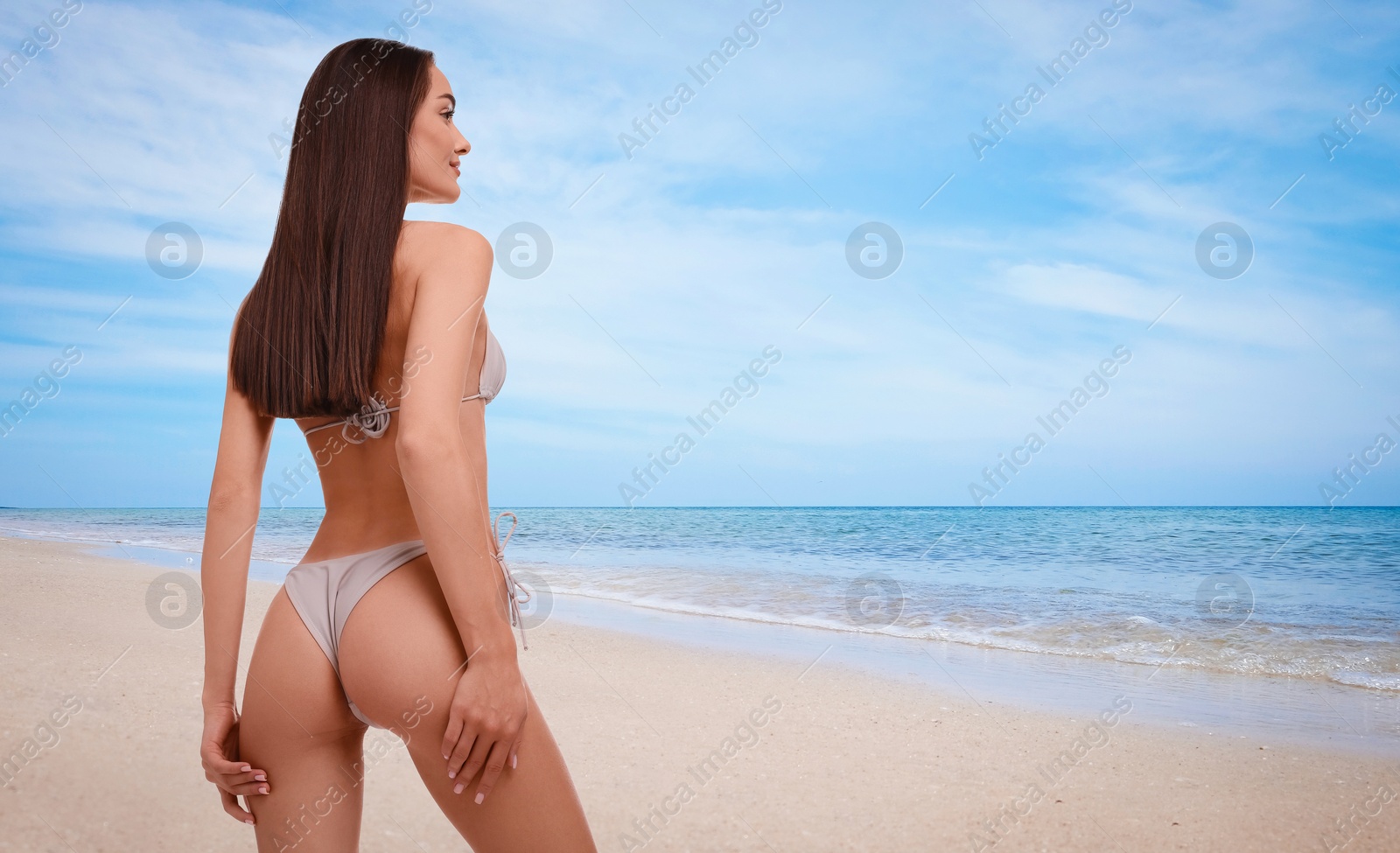 Image of Beautiful woman in stylish bikini on sandy beach near sea. Banner design with space for text