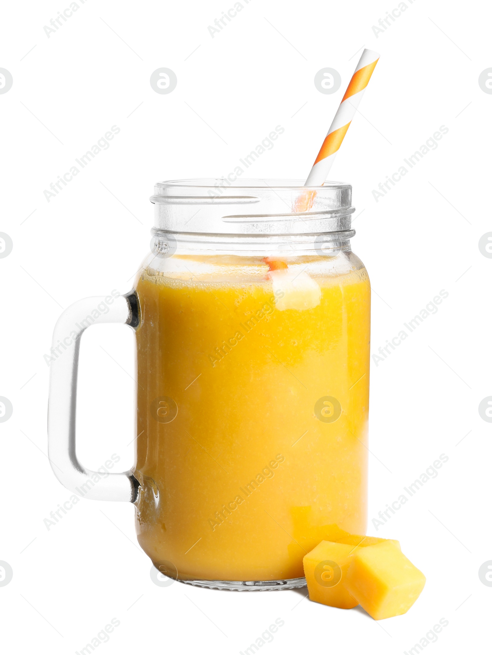 Photo of Mason jar of tasty mango smoothie and fruit slices on white background