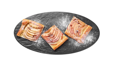 Photo of Pieces of delicious apple pie with powdered sugar isolated on white, top view