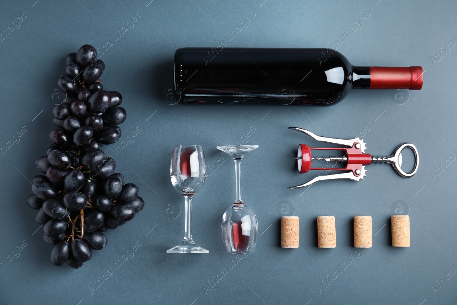 Photo of Flat lay composition with fresh ripe juicy grapes on color background