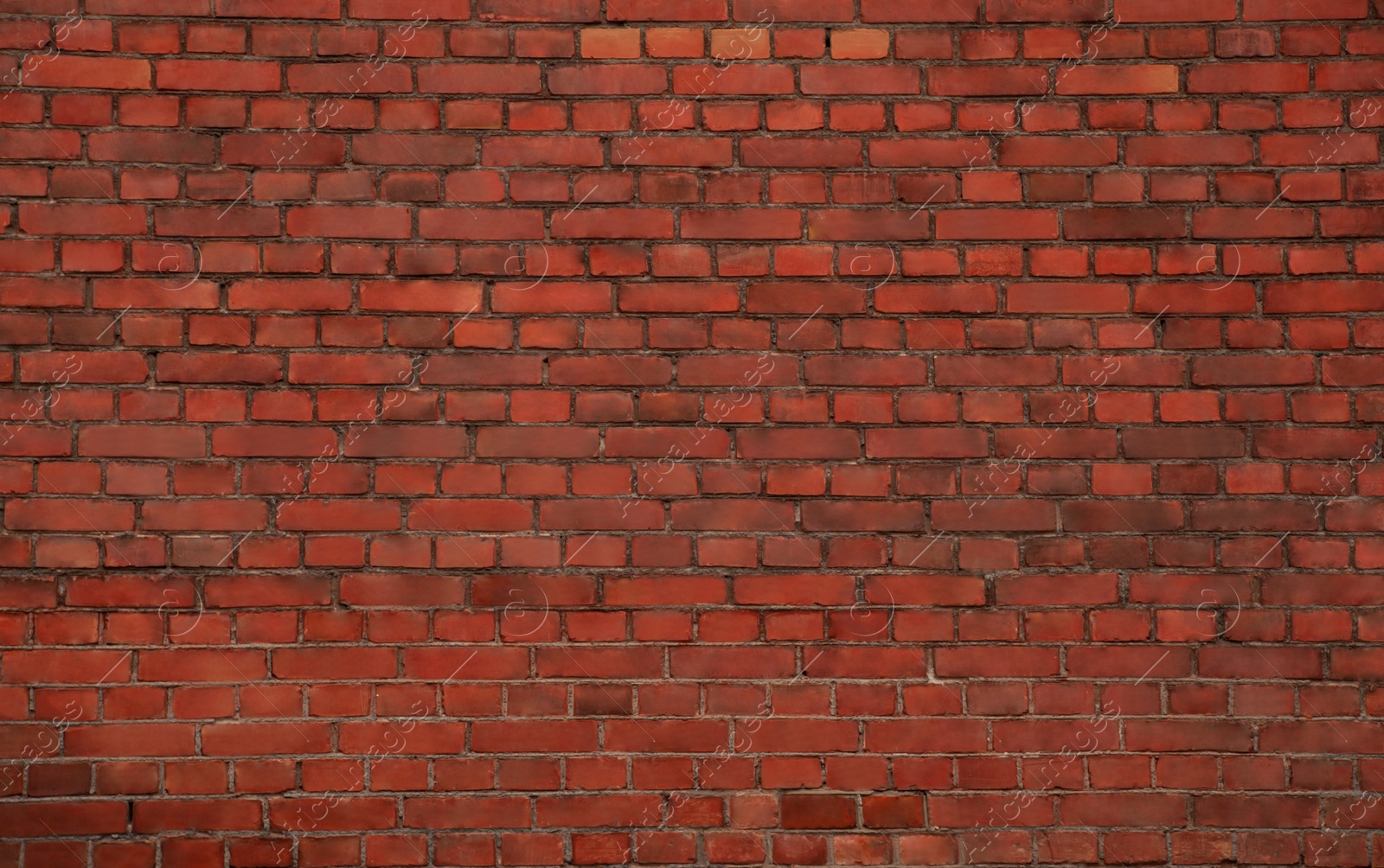 Photo of Texture of red brick wall as background