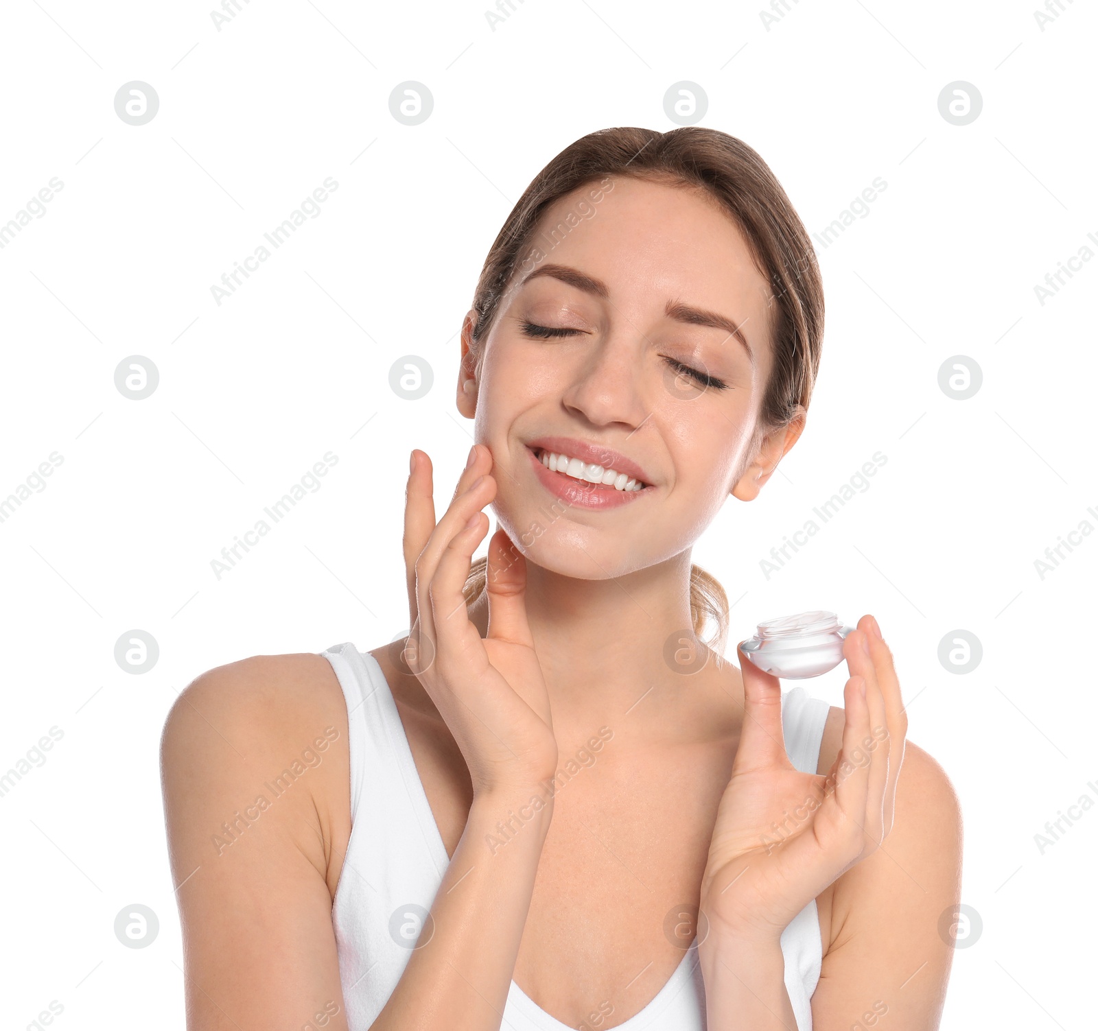 Photo of Portrait of young woman with jar of cream on white background. Beauty and body care