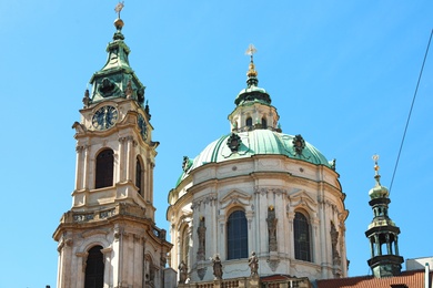 PRAGUE, CZECH REPUBLIC - APRIL 25, 2019: Saint Nicholas Church against blue sky