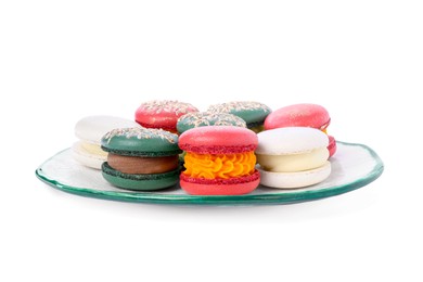 Photo of Beautifully decorated Christmas macarons in plate isolated on white