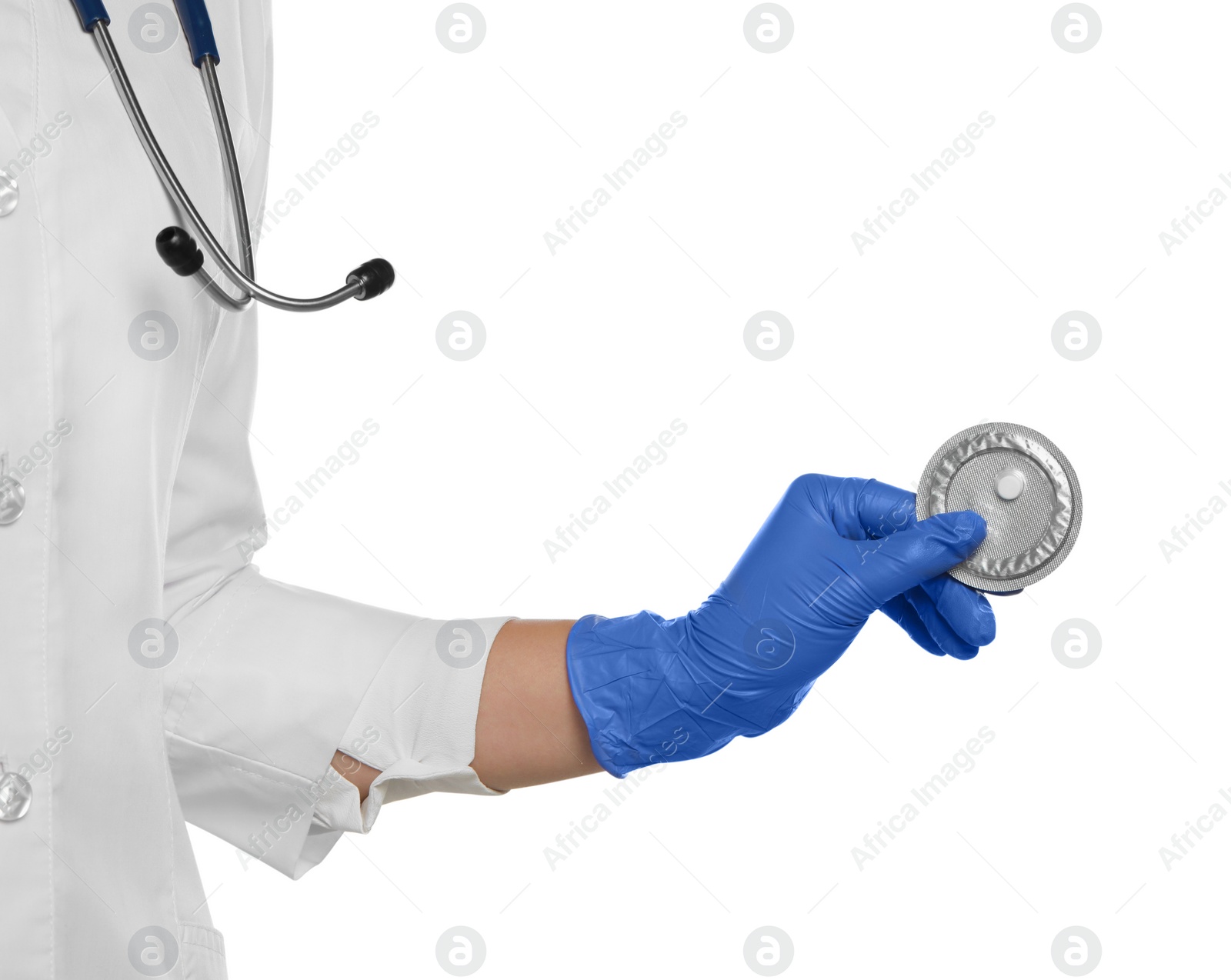 Photo of Doctor holding blister of emergency contraception pill on white background, closeup