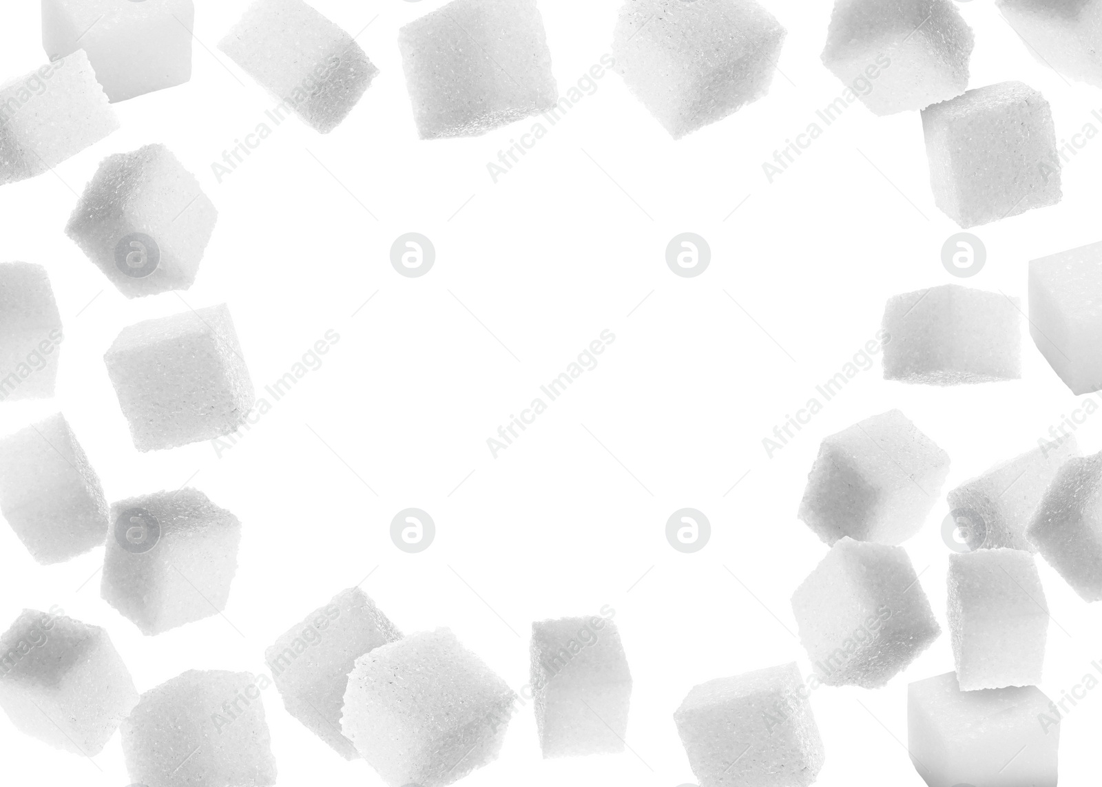 Image of Refined sugar cubes in air on white background