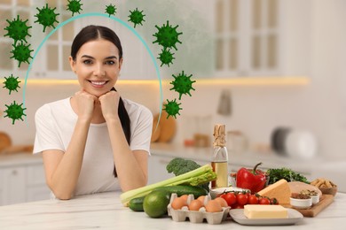 Happy woman with different food products in kitchen. Healthy diet - strong immunity