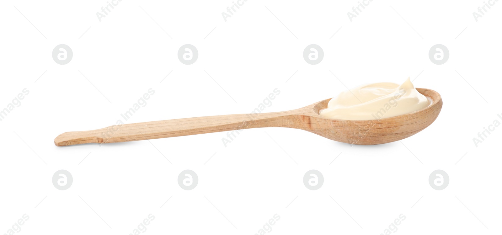 Photo of Wooden spoon with tasty mayonnaise isolated on white