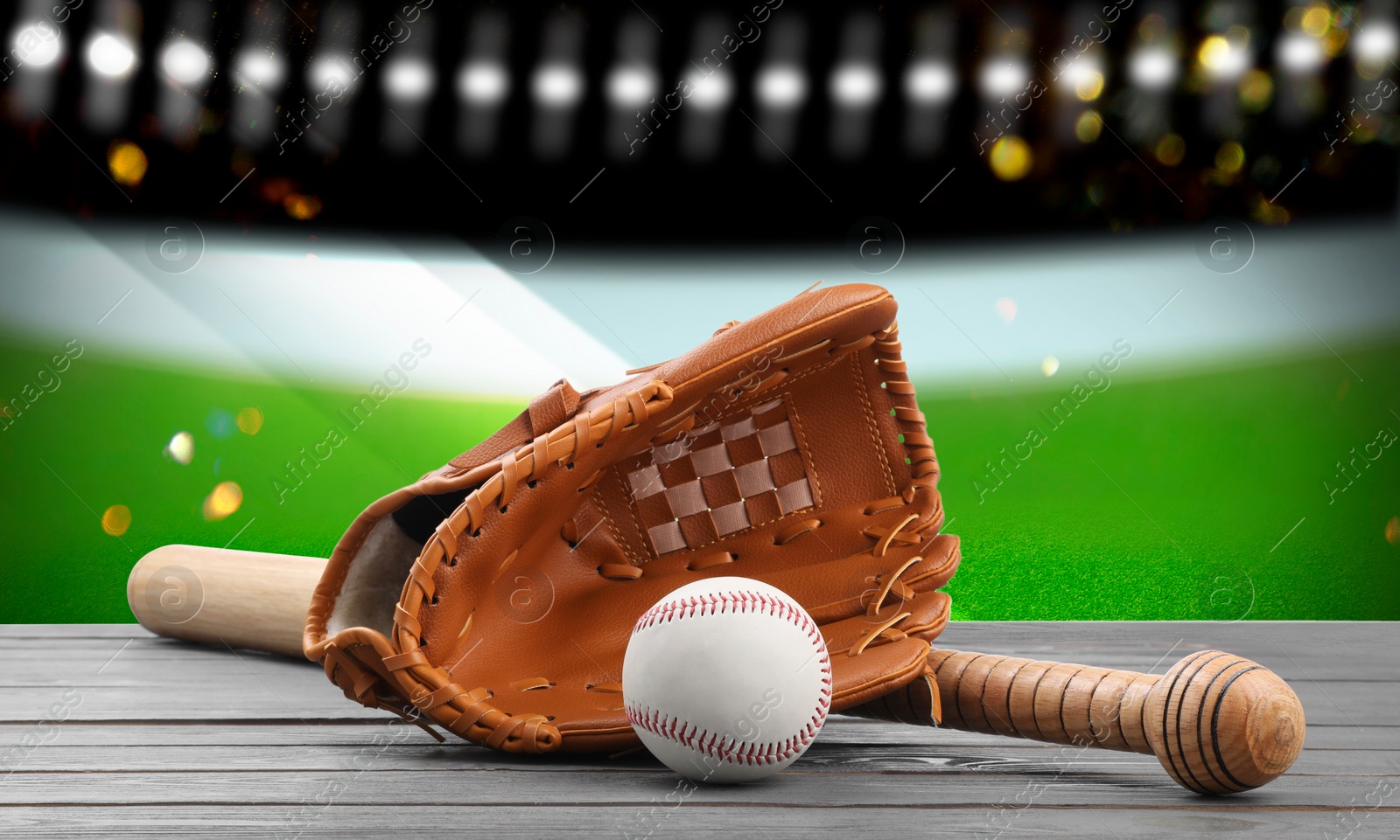 Image of Baseball bat, glove and ball on wooden table at stadium, banner design