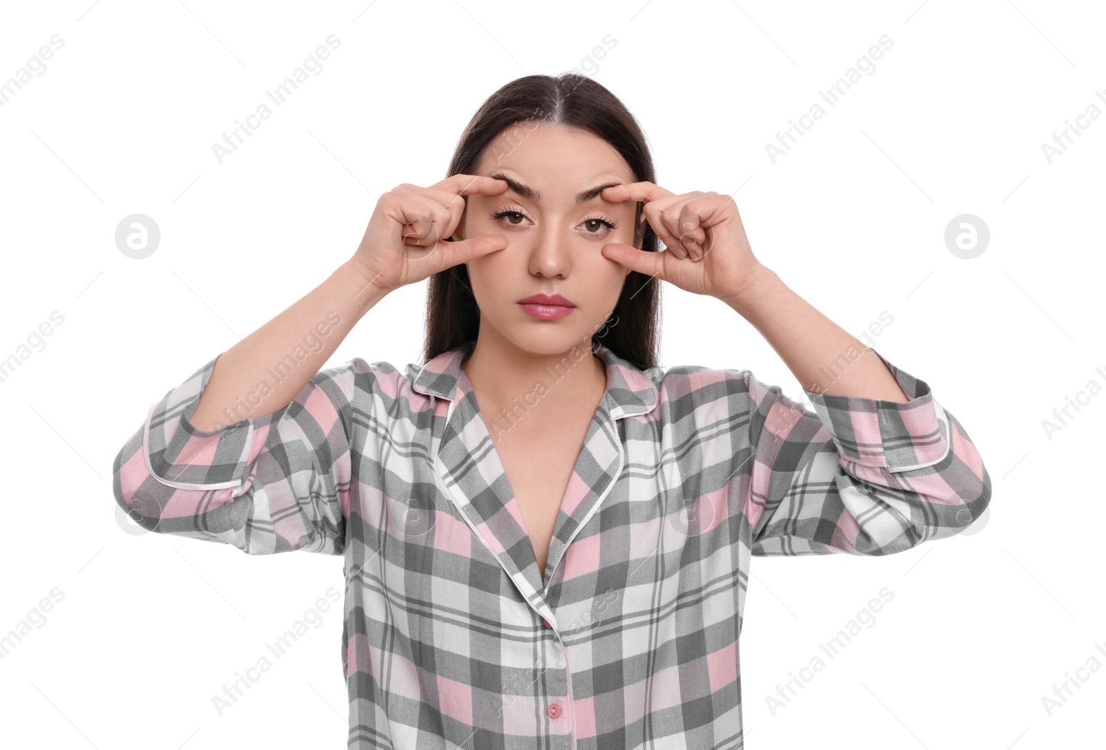 Photo of Tired young woman on white background. Insomnia problem