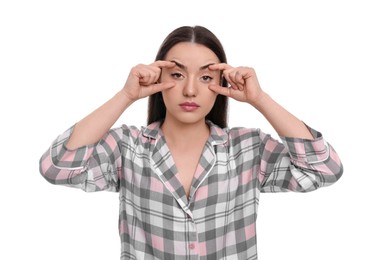 Tired young woman on white background. Insomnia problem