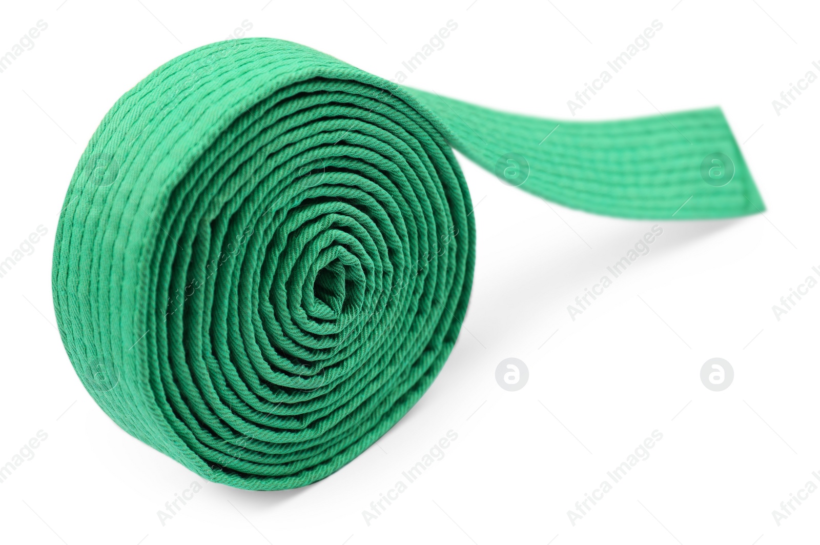 Photo of Green karate belt isolated on white. Martial arts uniform