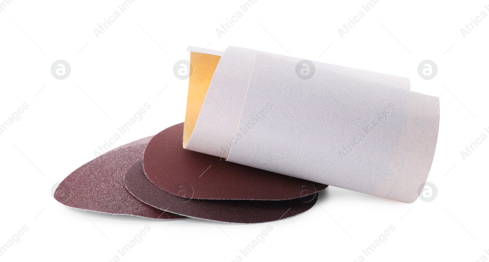 Photo of Many sheets of sandpaper isolated on white