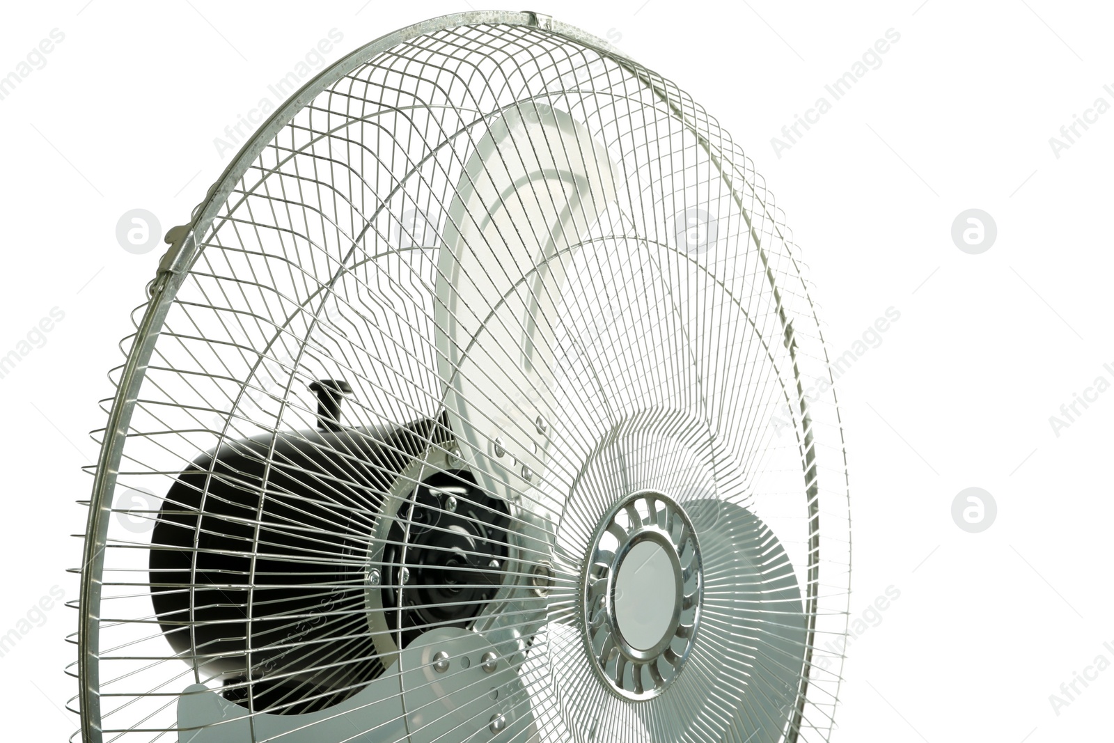 Photo of Electric fan on white background, closeup. Summer heat