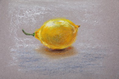 Photo of Pastel drawing of lemon on light background