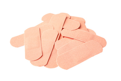 Photo of Medical sticking plasters isolated on white. First aid item