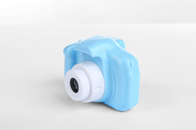 Photo of Light blue toy camera isolated on white