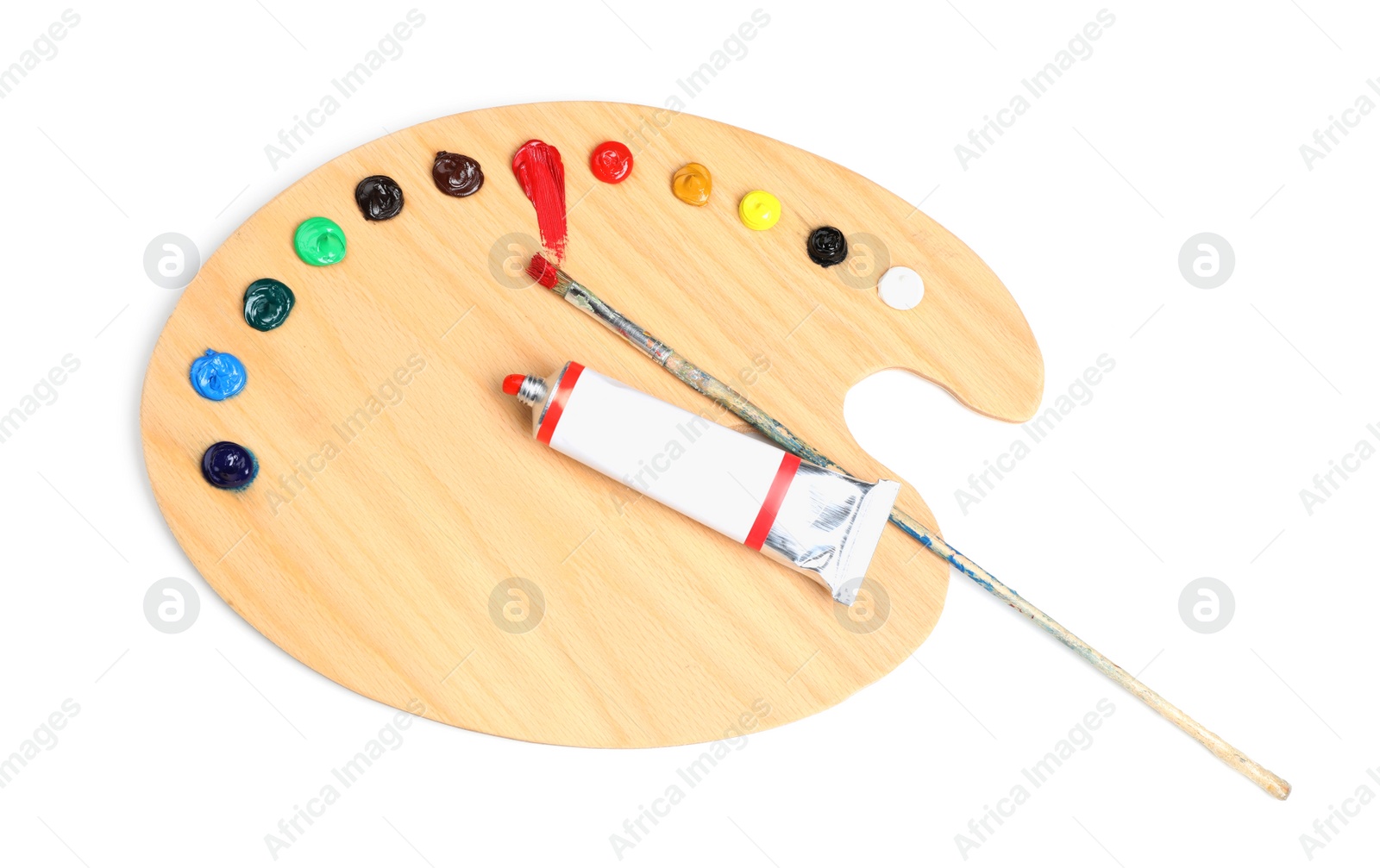 Photo of Palette with acrylic paints and brush on white background, top view. Artist equipment