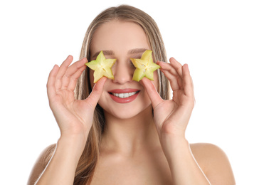 Photo of Young woman with cut carambola on white background. Vitamin rich food