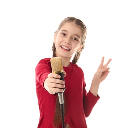 Photo of Cute girl with microphone on white background