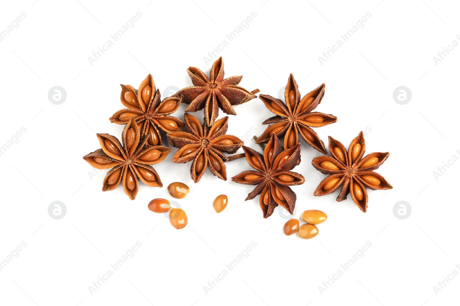 Photo of Dry anise stars with seeds on white background